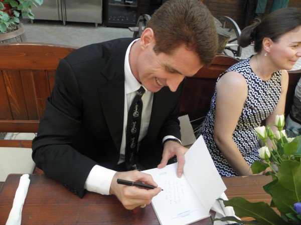 Gjekë Marinaj - Signing a Book